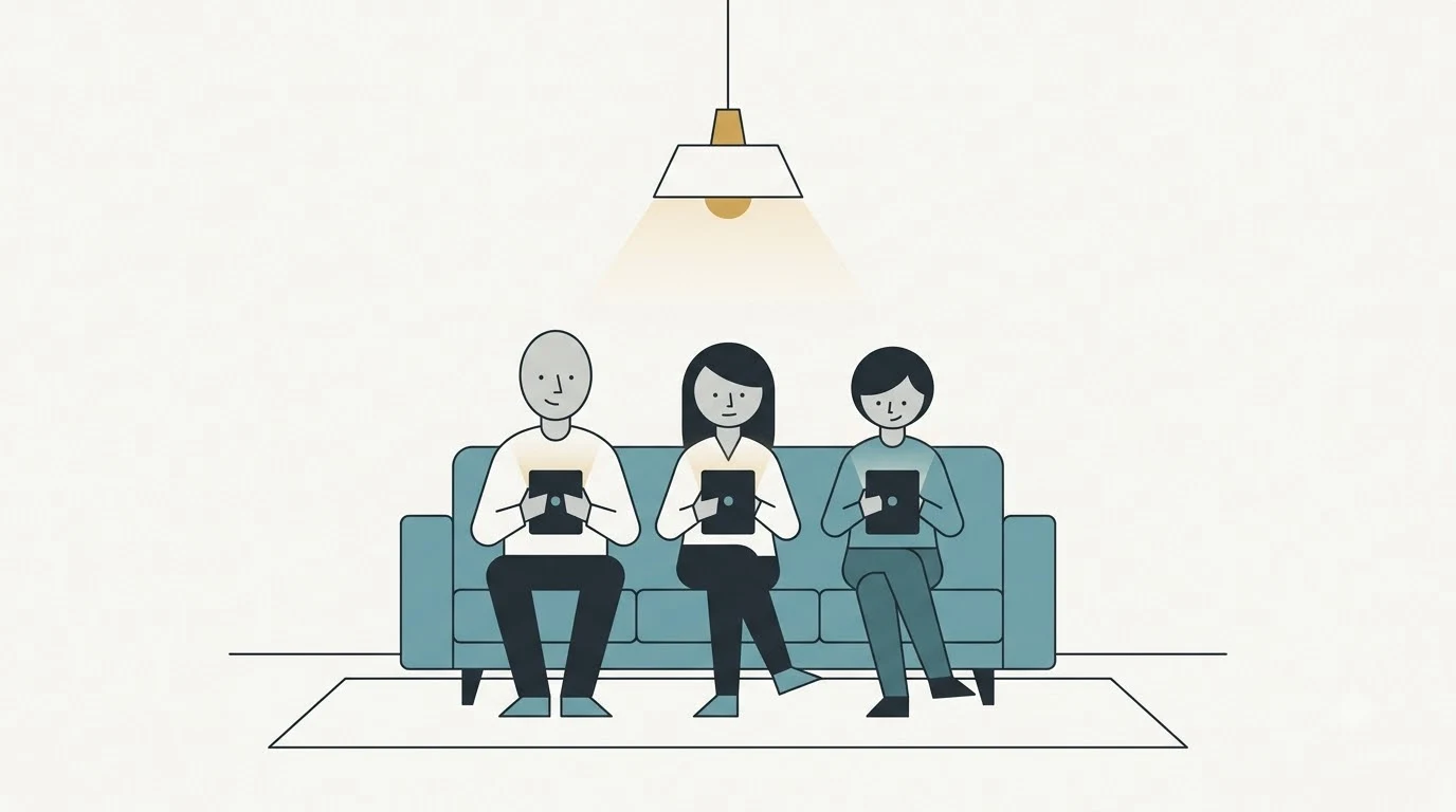 Three people sitting together on a couch while using individual electronic tablets.